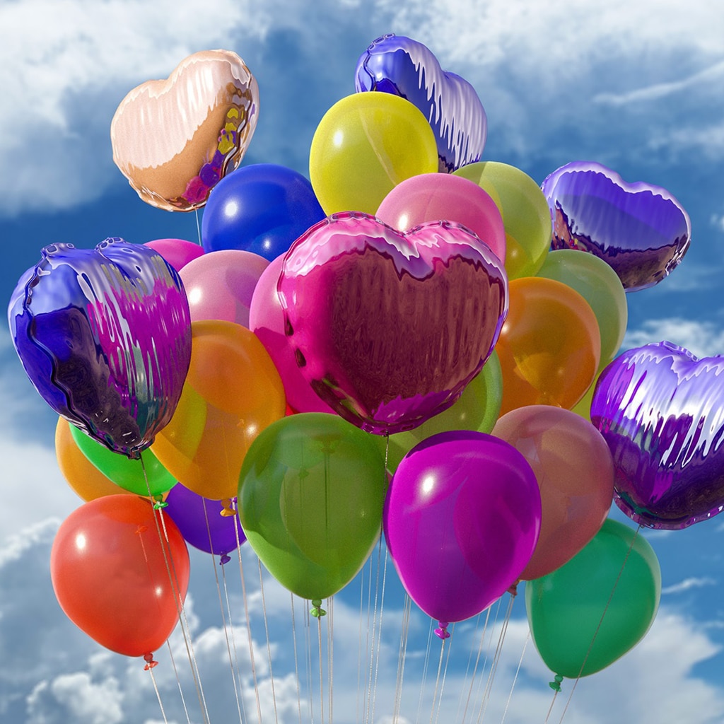 Luftballons mit Herz stehen für Geburtstagswünsche, die von Herzen kommen